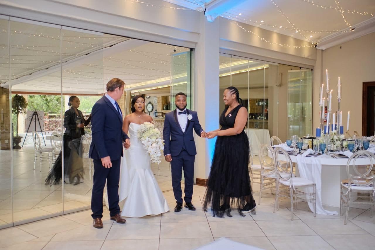 The Kuhle team welcoming the newlyweds into the styled reception room