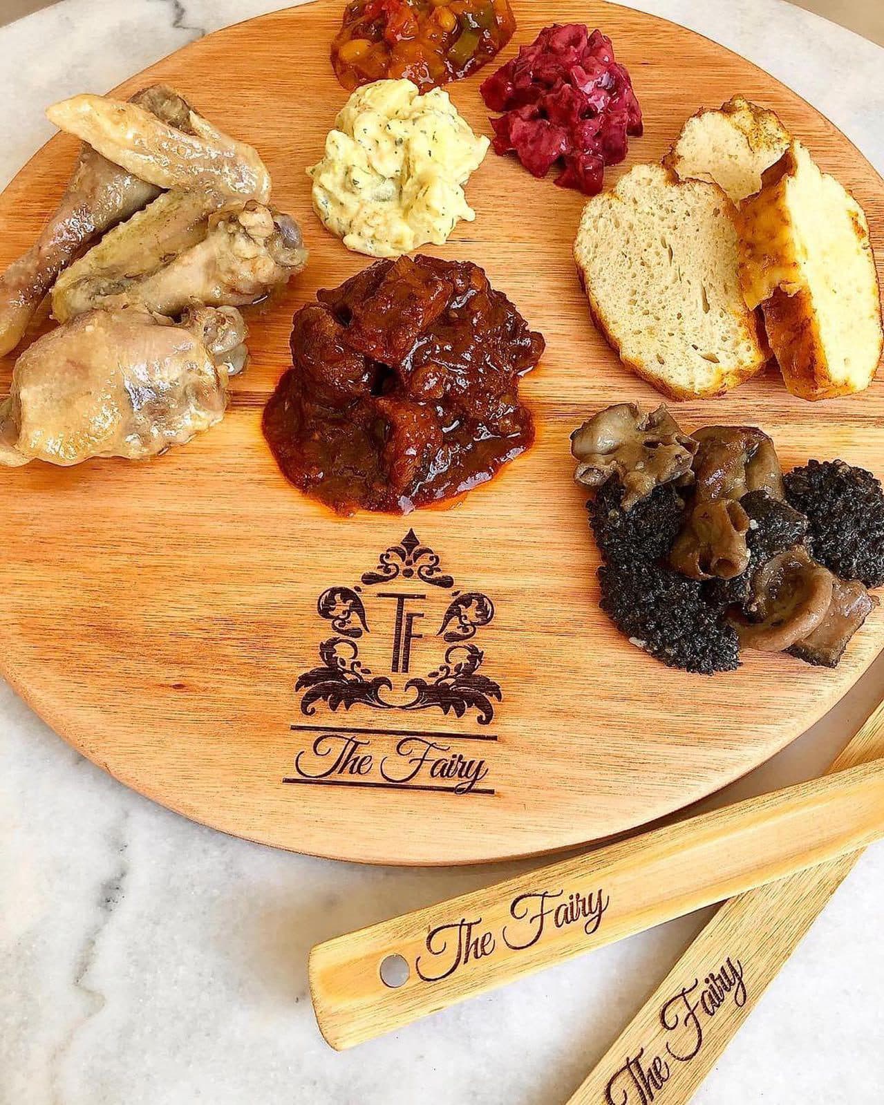 A custom-branded client board styled for a private event