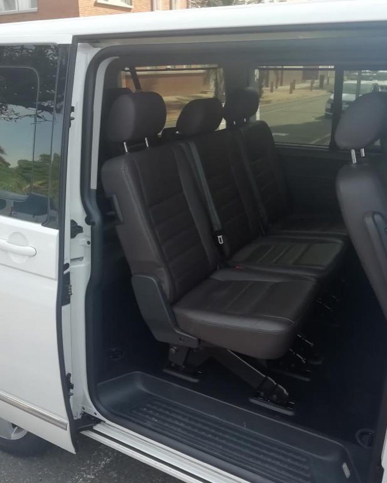 Leather passenger seating inside a Kuhle shuttle